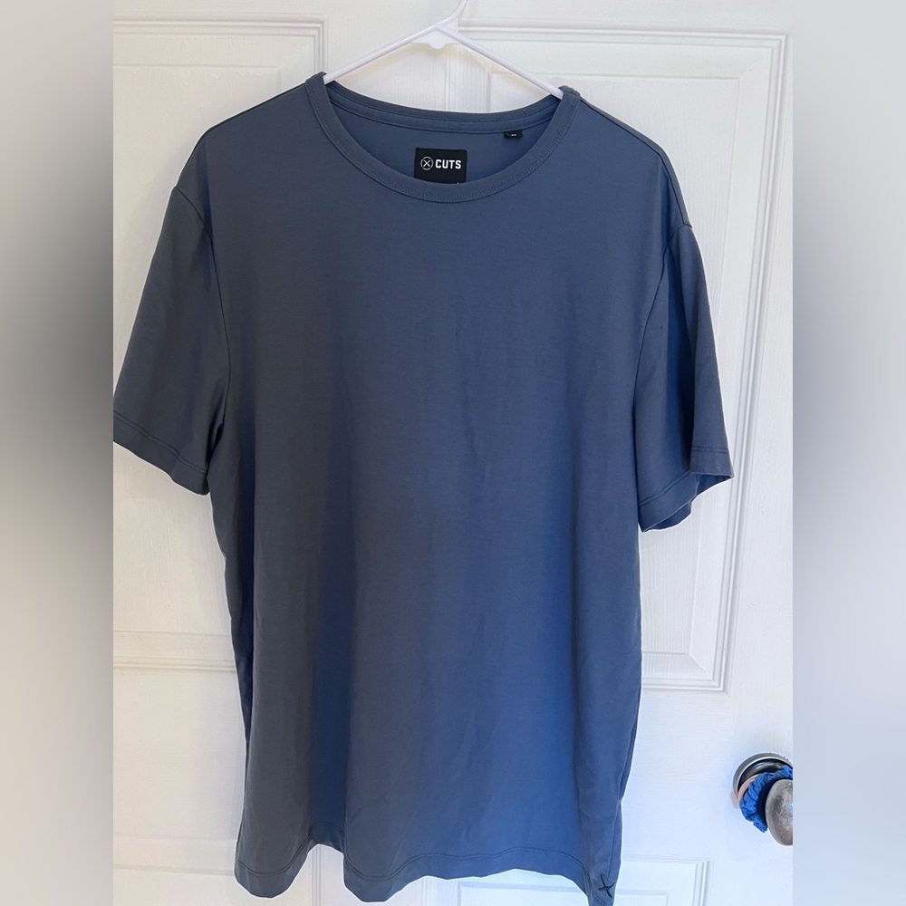Cuts tee shirt. Like new. Greyish blue color. Large